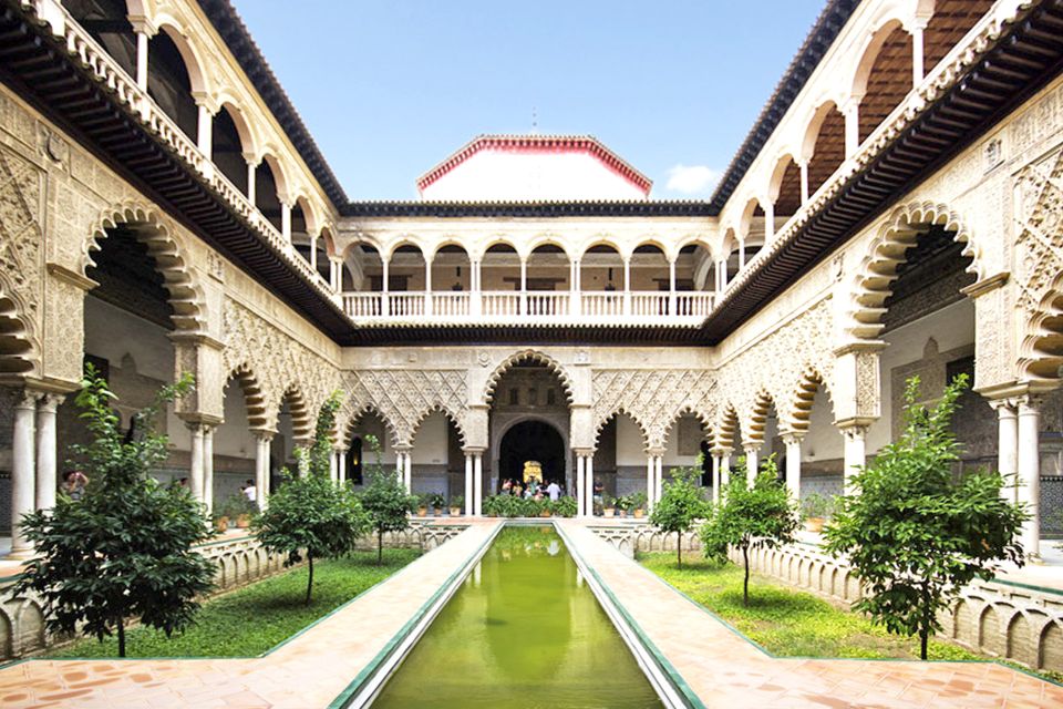 Cities of Andalusia 4-Day Tour from Madrid - Seville in the morning: Plaza de España, Giralda views, and Santa Cruz wandering