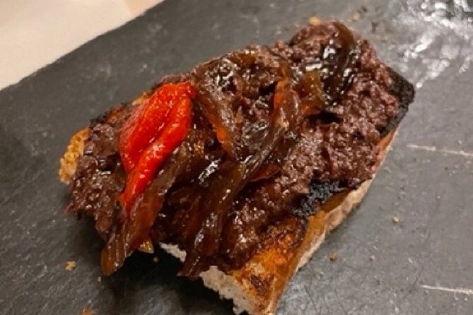 Madrid by Night Small Group Tour: Stories, Sights and Tapas Bites - Starting at Ópera: how the night kicks off in Plaza Isabel II