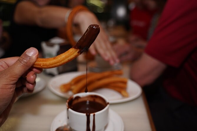 Madrid by Night: Tapas Crawl, Local Drinks & Hidden Gems - Stop 4: Plaza Mayor and the bocadillo de calamares moment