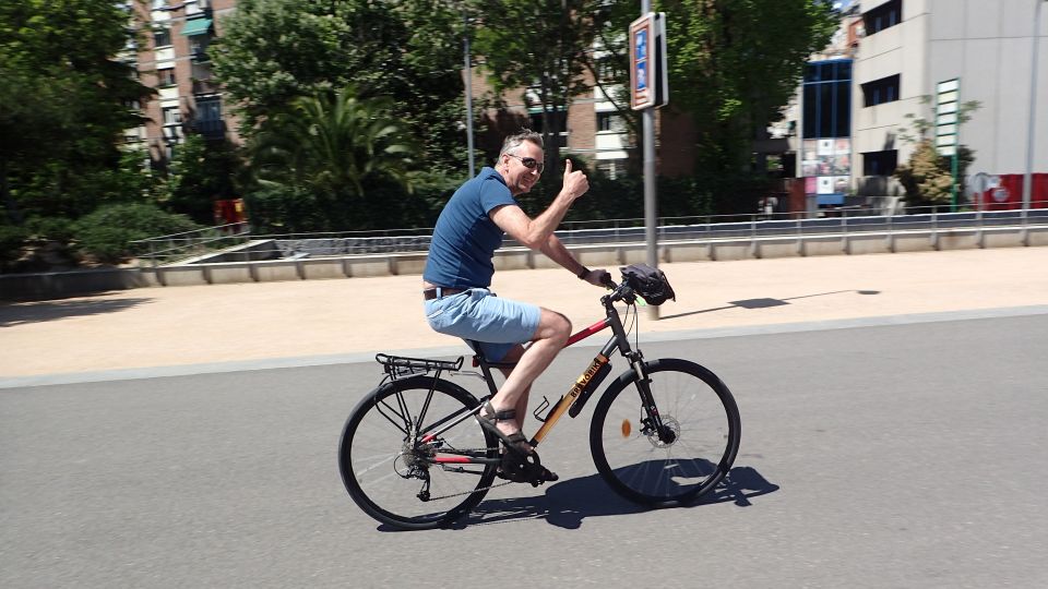 Madrid City Guided Bike/E-Bike Tour for Small Groups - Alcalá Gate, Calle Serrano, and the ride into Chueca