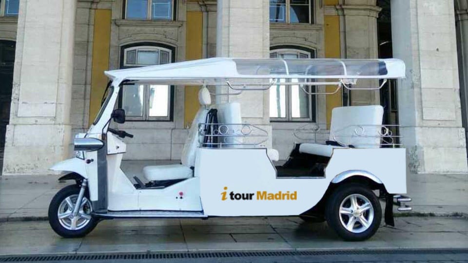 Madrid: City Highlights Tuk Tuk Tour - Puerta de Alcalá and Paseo del Prado: big views, quick context