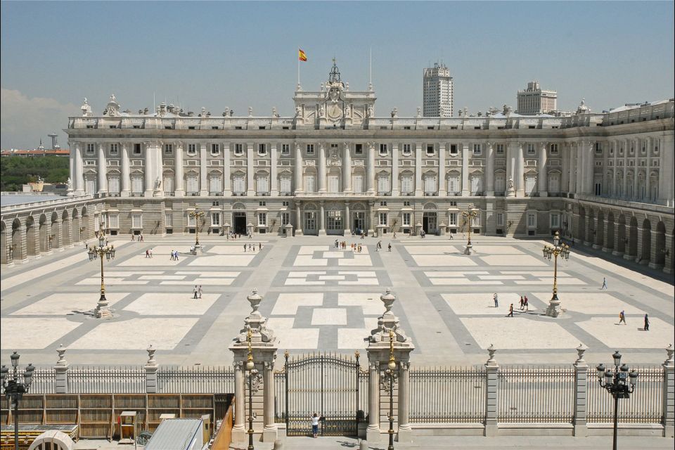 Madrid: El Prado Museum and the Royal Palace Guided Tour - The city walk: Neptune Fountain, Sol, and landmarks with context