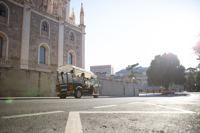 Madrid Expert Plus Tour with Local Guide in Eco Tuk Tuk Private - Fountains, libraries, and the Bank of Spain area