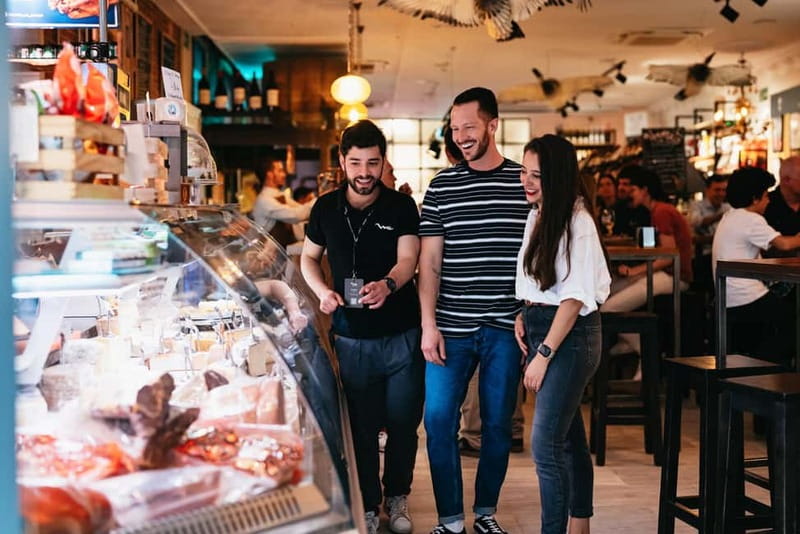 Madrid: Guided Tapas and Wine Tour with Terrace Visit - The La Cebada-Style Market Time: Eating in Public Like a Local