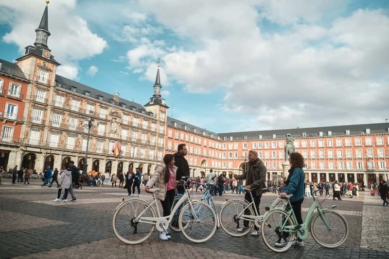 Madrid: Highlights Guided Vintage Bike Tour and Tapas Option - Royal Palace, Plaza de la Villa, and Plaza Mayor: the classic Madrid triangle