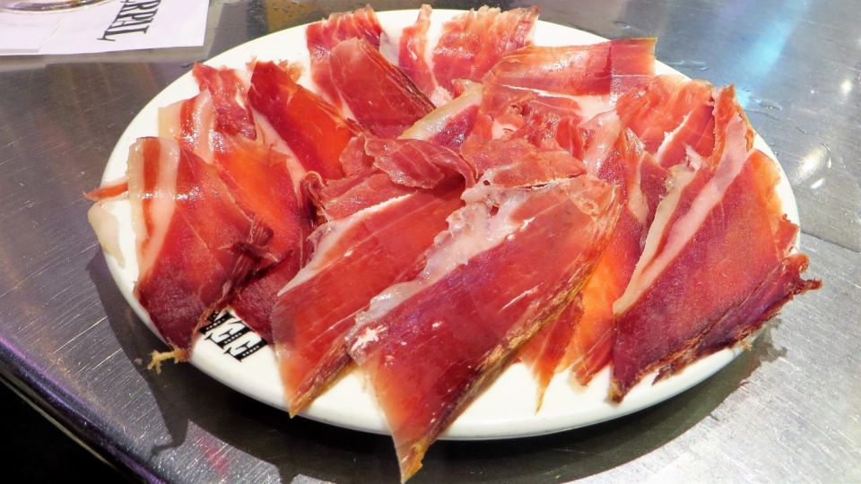Madrid: Iberico Ham and Spanish Wine Small-Group Food Tour - Spanish wine tasting: matching flavors across regions
