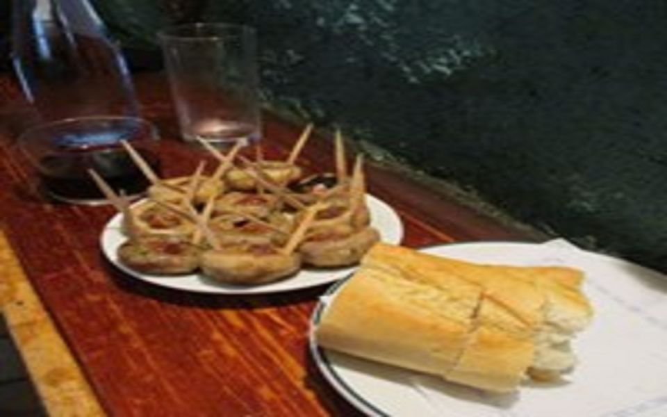 Madrid: Old Madrid Walking Food and Wine Tour - Walking Between Landmarks: Puerta del Sol, Plaza Mayor, San Ginés