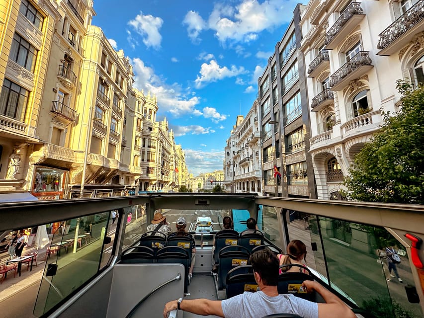 Madrid: Panoramic Open-Top Bus Day or Night Tour with Guide - Night Madrid From an Open-Top Bus: The Big Idea