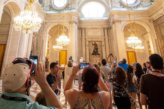 Madrid: Royal Palace Expert Guided Tour with Optional Tapas - Skip-the-line entry and the best tool in the building: headsets