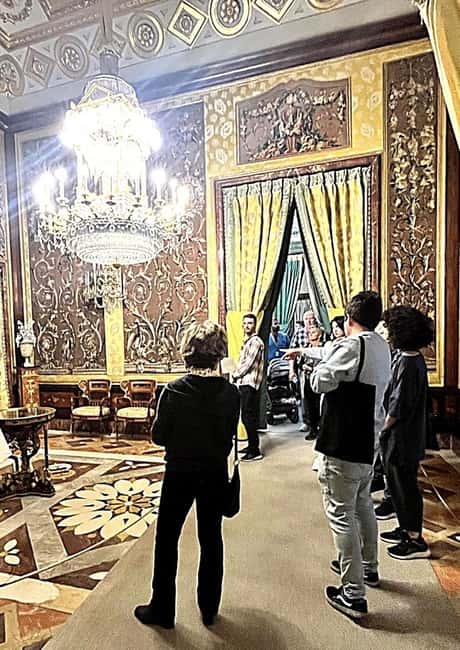 Madrid: Royal Palace Guided Tour with Entry Ticket - Entering the palace through the main staircase area