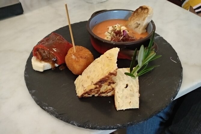 Madrid Small Group Tapas Tour at 4 Venues -Lunch or Dinner - Royal Palace district and Old City Hall: history breaks between tastings