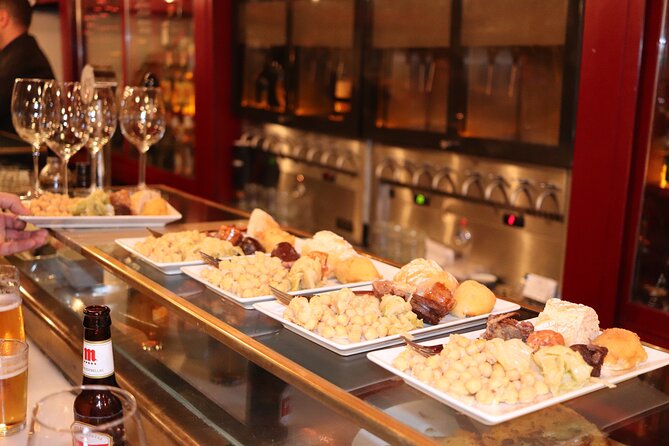 Madrid Small Group Tapas Tour at 4 Venues -Lunch or Dinner - The final square and the churros-chocolate payoff