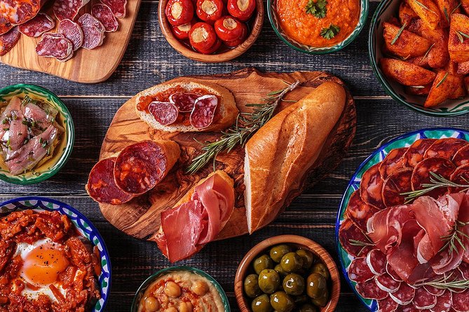 Madrid Tapas Experience Walking Tour - Stop 5 jamón comparison near Huertas: learn the cuts, not just the meat