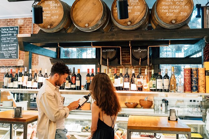 Madrid Tapas & Wine Tour with Rooftop Views and Local Guide - Plaza de San Miguel to La Latina: Mushrooms, Padrón Peppers, and Beer Decisions