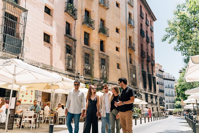 Madrid Tapas & Wine Tour with Rooftop Views and Local Guide - Barrio de las Letras Finish: Plaza de Santa Ana, Terraces, and Garlic Shrimp
