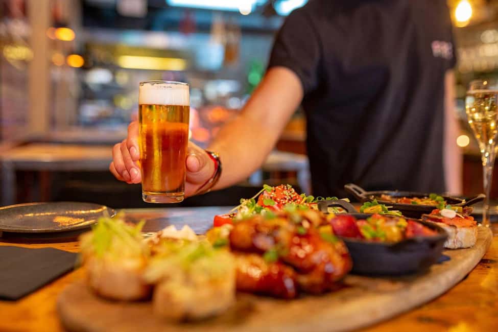 Madrid: Tasty Tapas Tour & Visit to a Terrace with Views - Where the tour starts and how the evening is paced
