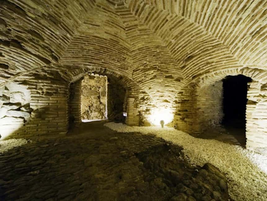 Toledo: Underground Guided Tour with Entry Ticket - Cuevas de Hércules: Vaulted Space, Water Reservoir Logic, and Myths