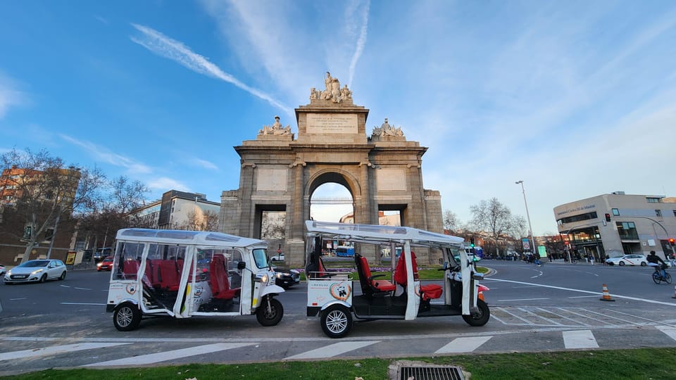 Tour Madrid: Secrets in a Electric Tuk Tuk - Electric tuk tuk in Madrid: quick orientation with room to breathe